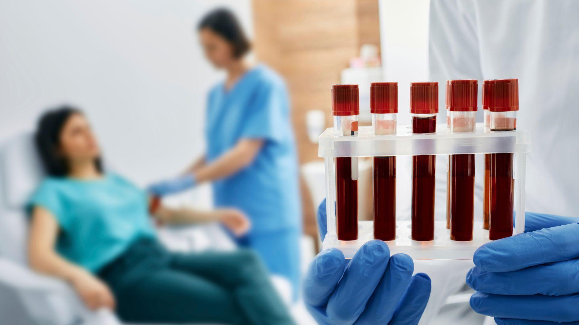 Blood Work - a nurse taking some blood sample from patient