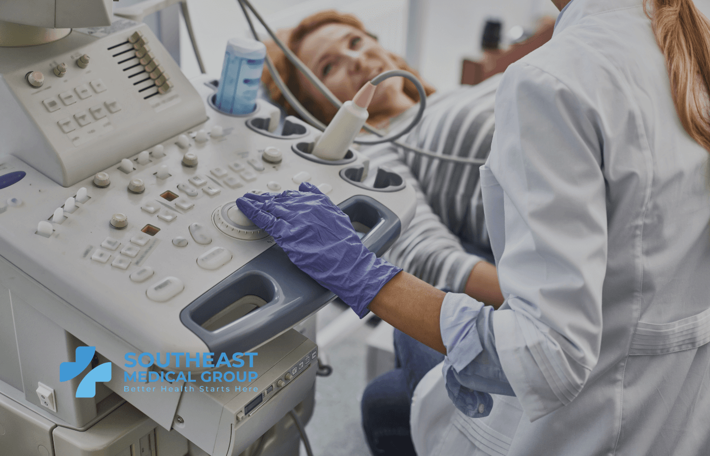 A medical professional operates an ultrasound machine with a patient in the background and the Southeast Medical Group logo.