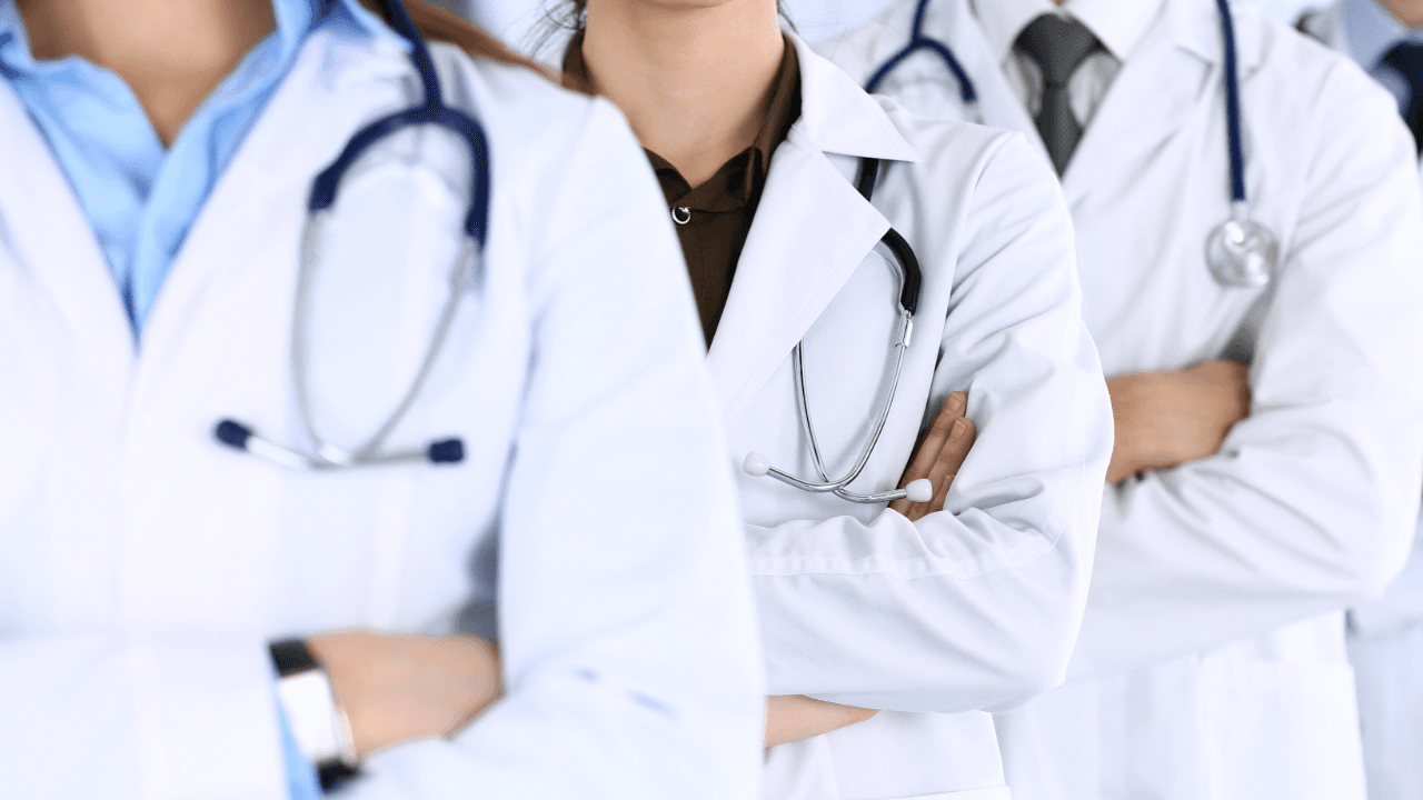 Physician Assistant Needed: a group of doctors standing with their arms crossed