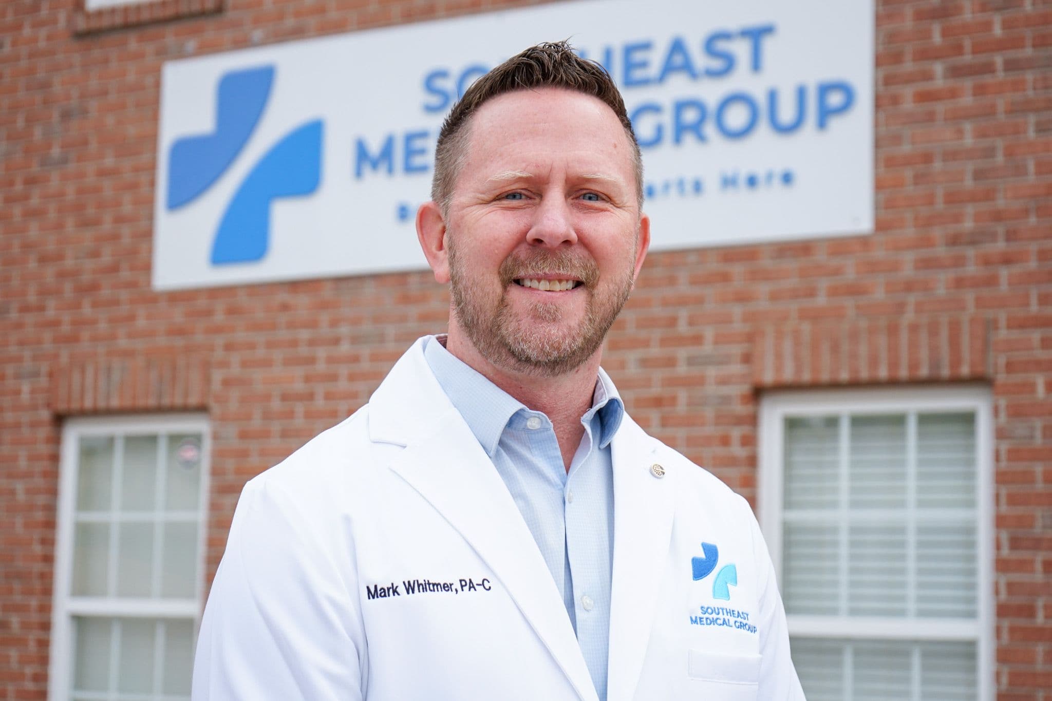 Mark Whitmer, PA-C, sees patients at Southeast Medical Group at Walnut Creek in McDonough, Georgia.