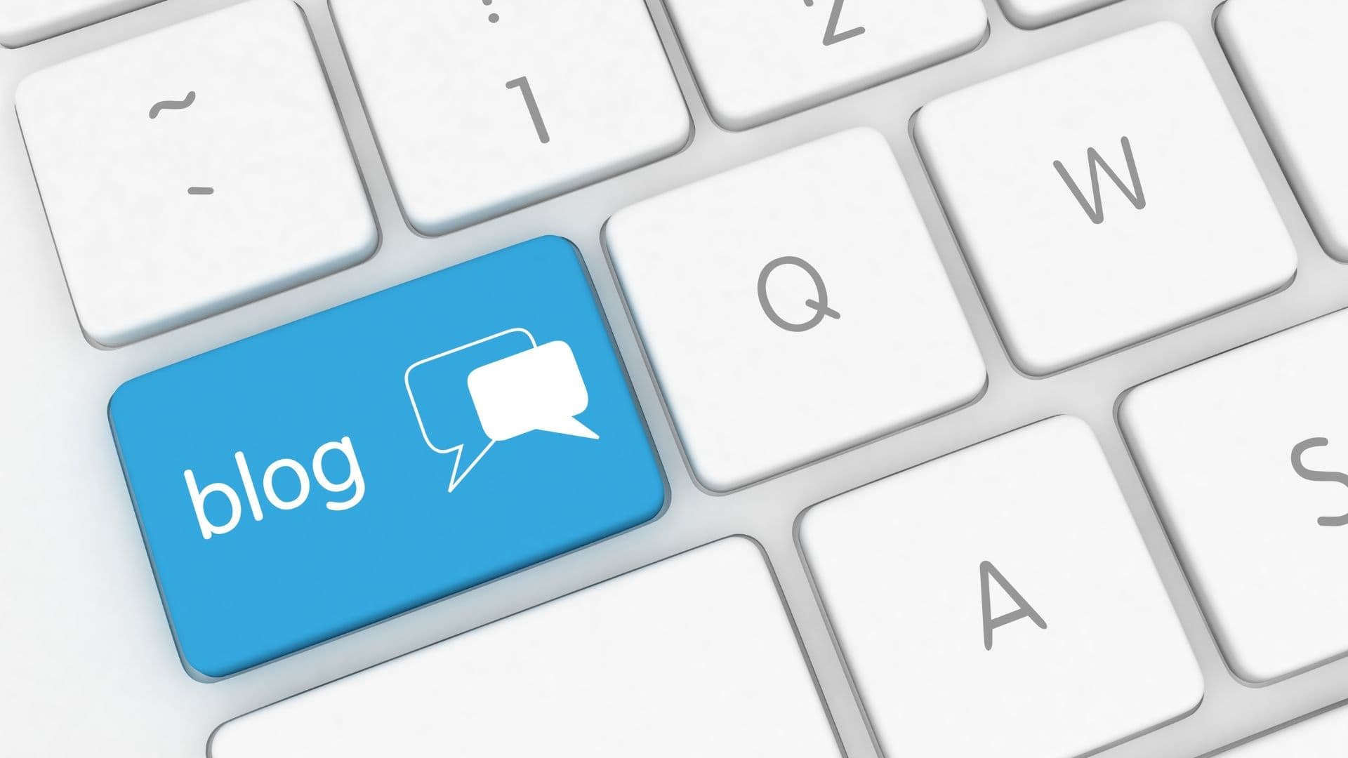 Keyboard with a blue "blog" key featuring speech bubble icons.