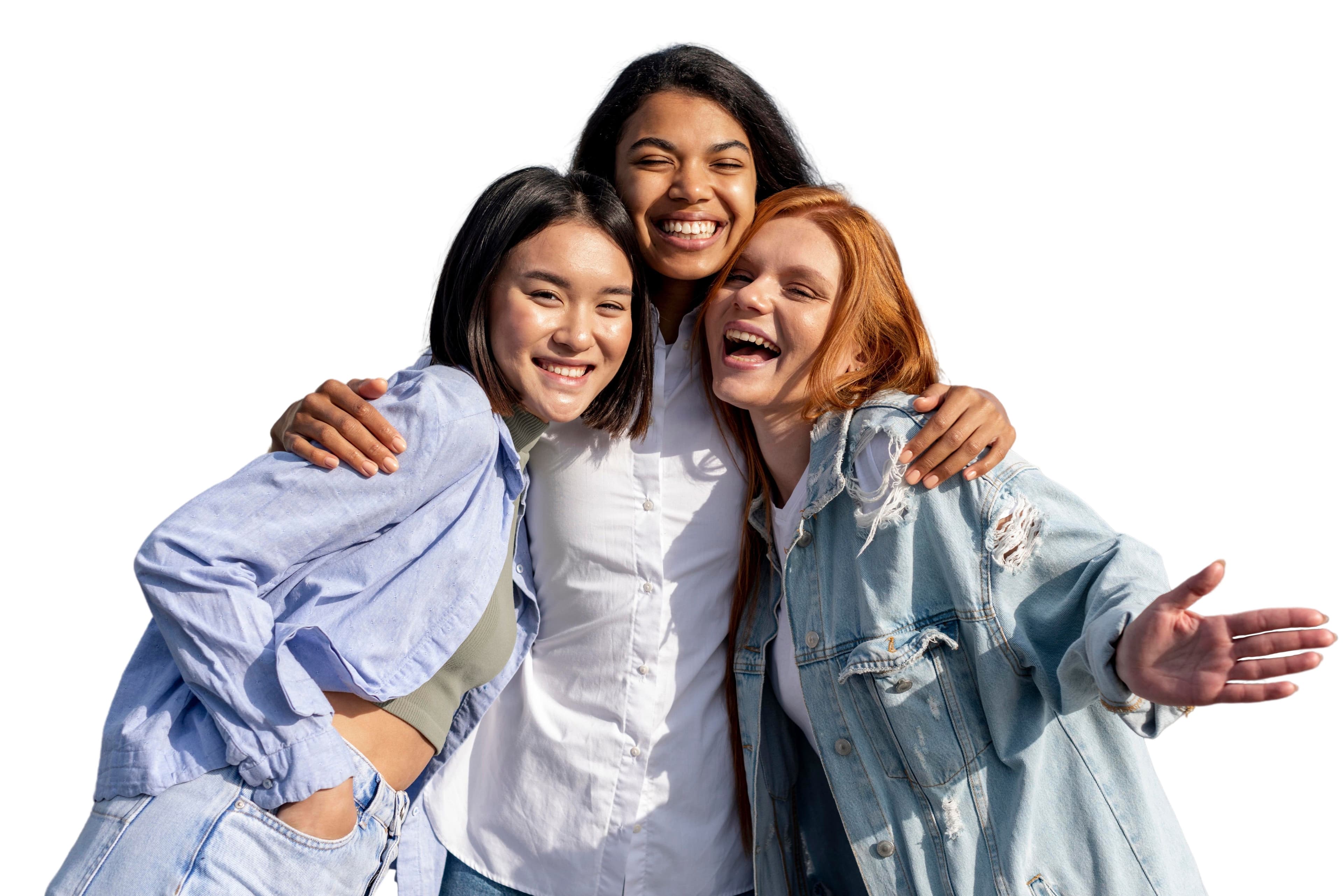Womens health month: three young women are hugging each other and smiling .