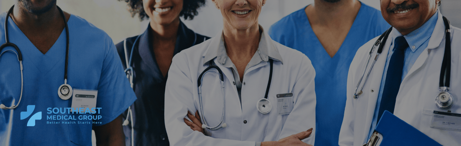 Medical team in lab coats and scrubs with Southeast Medical Group logo.