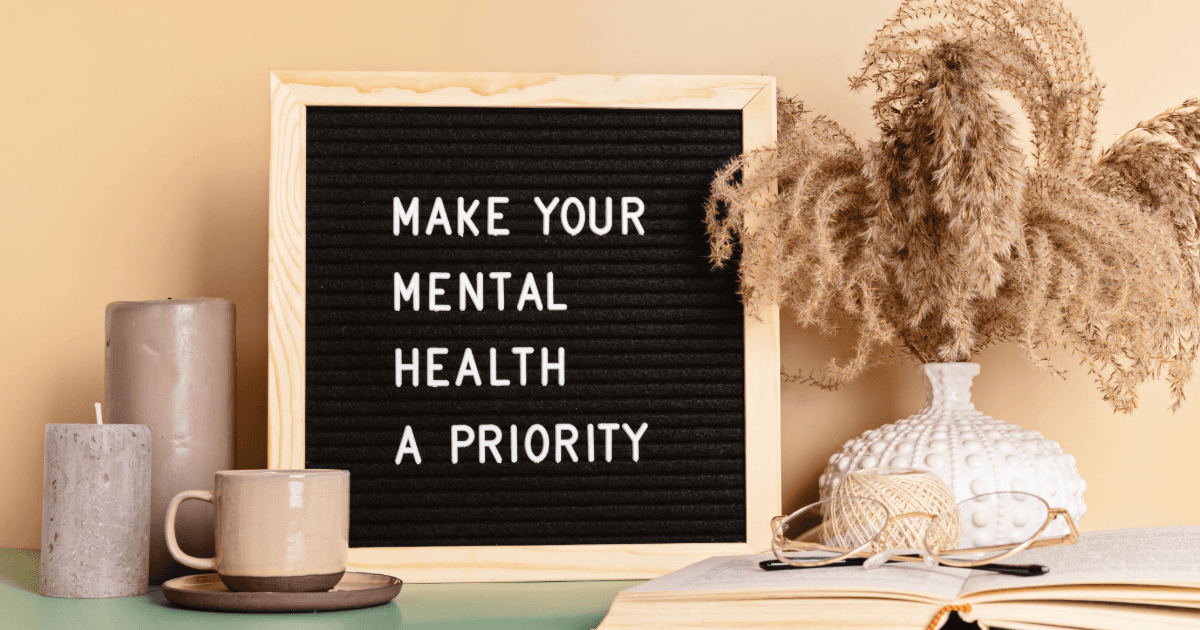 a sign that says make your mental health a priority